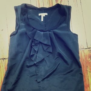 Black sleeveless top with ruffle front detail